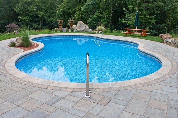 Concrete pavers pool decking